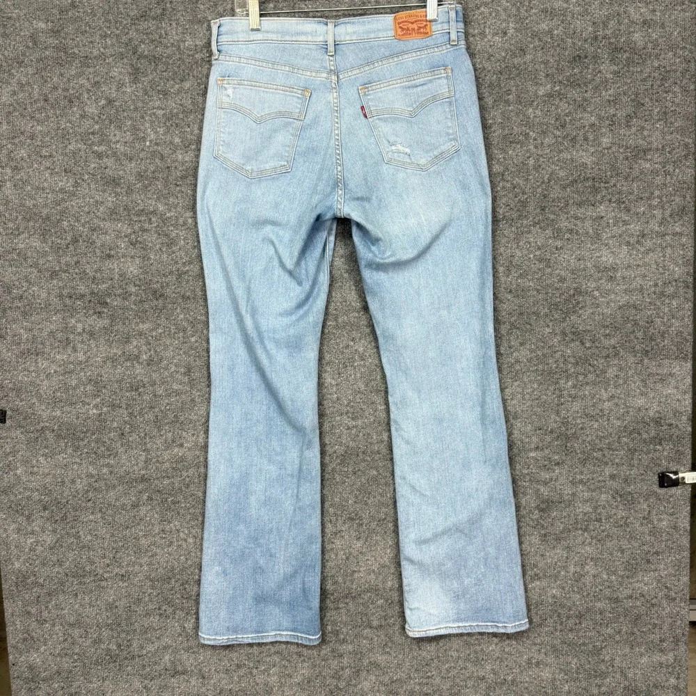 Levis Jeans Womens 10 Blue Light Wash Classic Bootcut Distressed Stretch 32x31